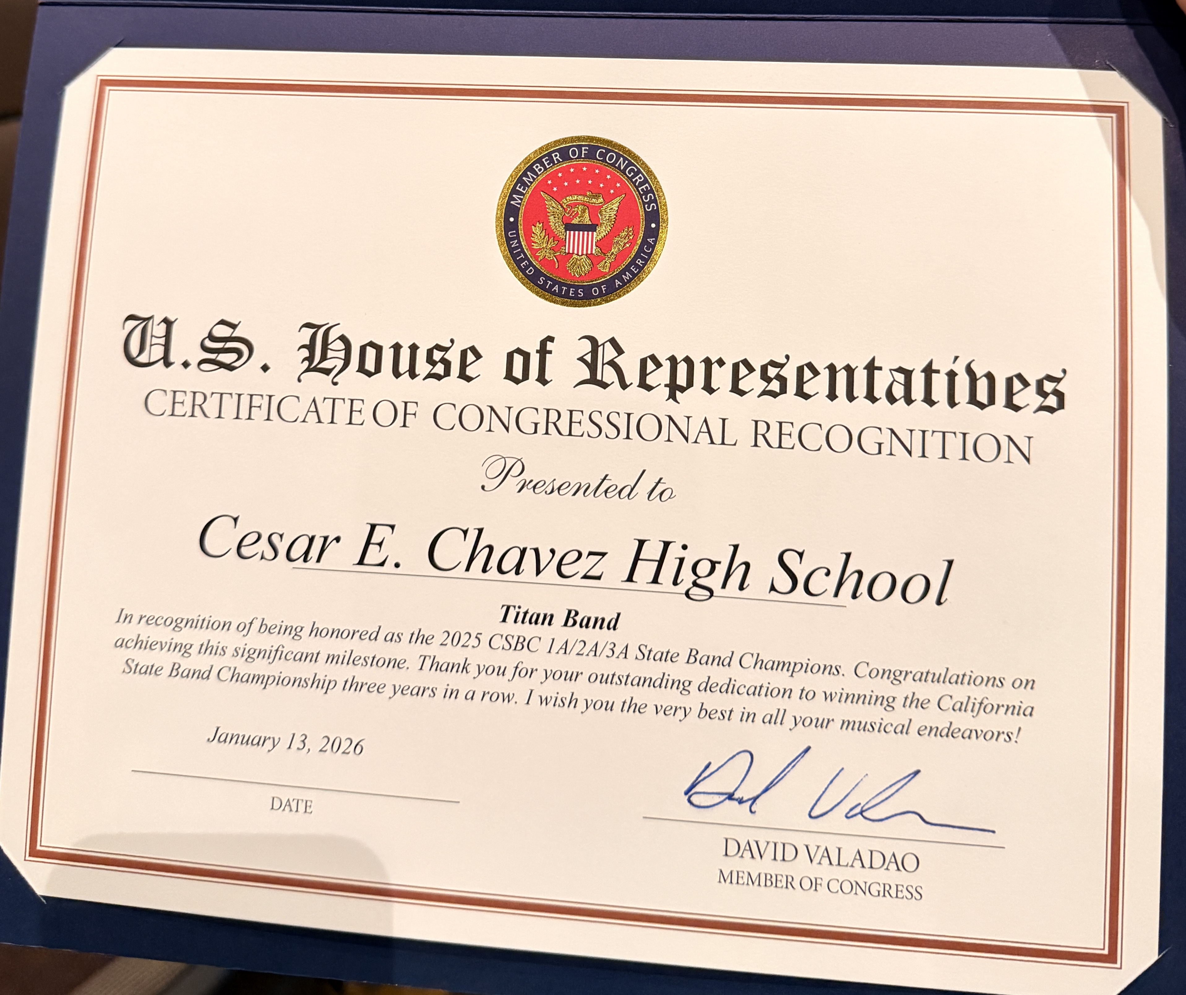 The image is a certificate from the U.S. House of Representatives, presented to Cesar E. Chavez High School in recognition of their marching band's achievements as California State Band Champions.