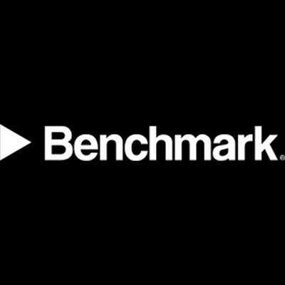 The image displays the word "Benchmark" in large white text against a black background.