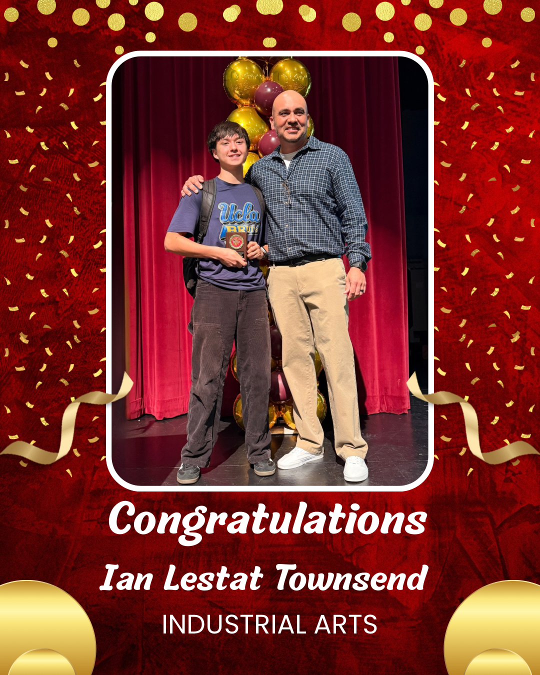 The image shows two people, a younger person and an older person, standing on a stage with a red curtain backdrop and confetti falling around them. The text "Congratulations Ian Lestat Townsend INDUSTRIAL ARTS" is displayed below the image.
