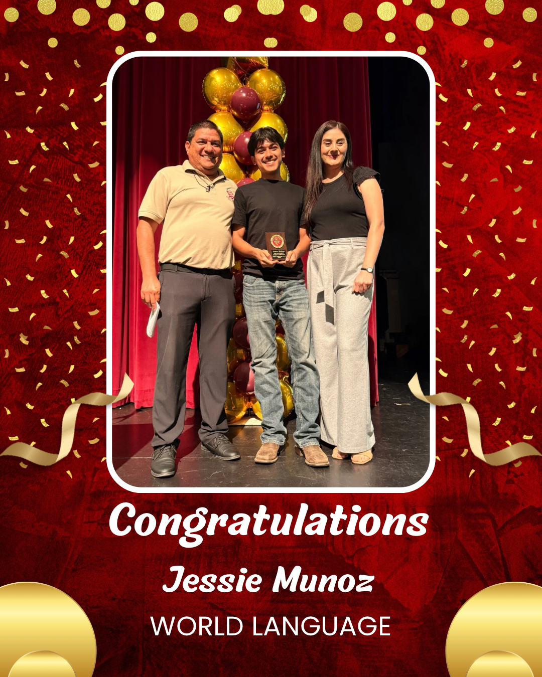 The image shows three people standing on a stage, with a "Congratulations Jessie Munoz" banner in the foreground and a red curtain and confetti-like decorations in the background.