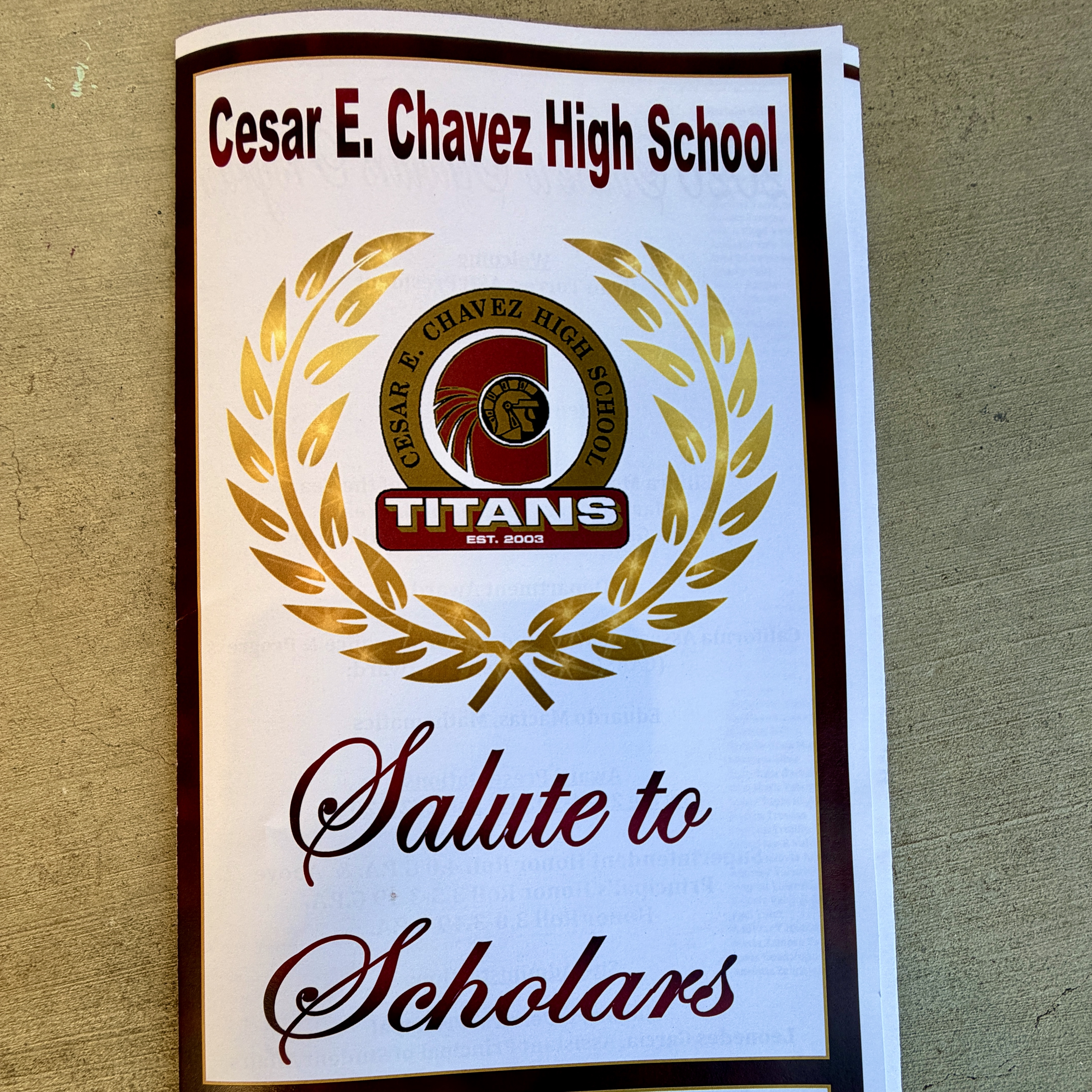The image shows the logo and name of Cesar E. Chavez High School, along with the text "Salute to Scholars" and the school's mascot, the Titans.