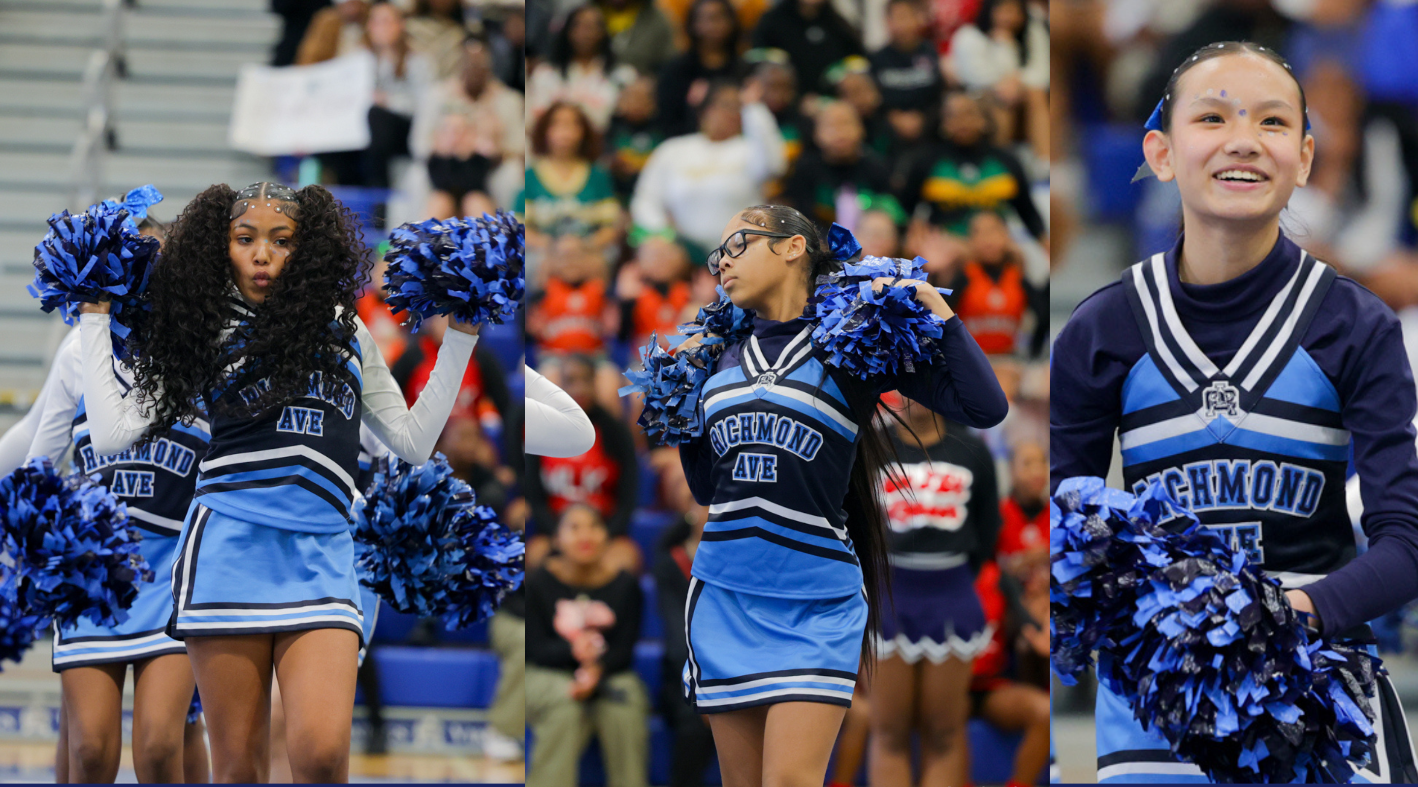 A group of cheerleaders in blue and white uniforms performing on a basketball court, with a crowd of spectators visible in the background.