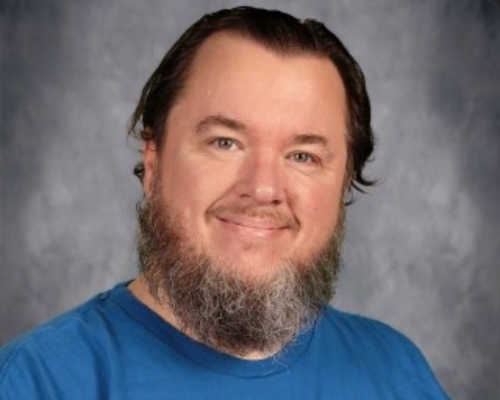 Maize High School debate coach earns fourth national award