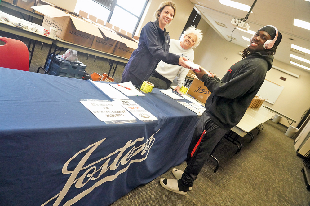 Cap & Gown Pickup Underway At High School | Campus Life Details