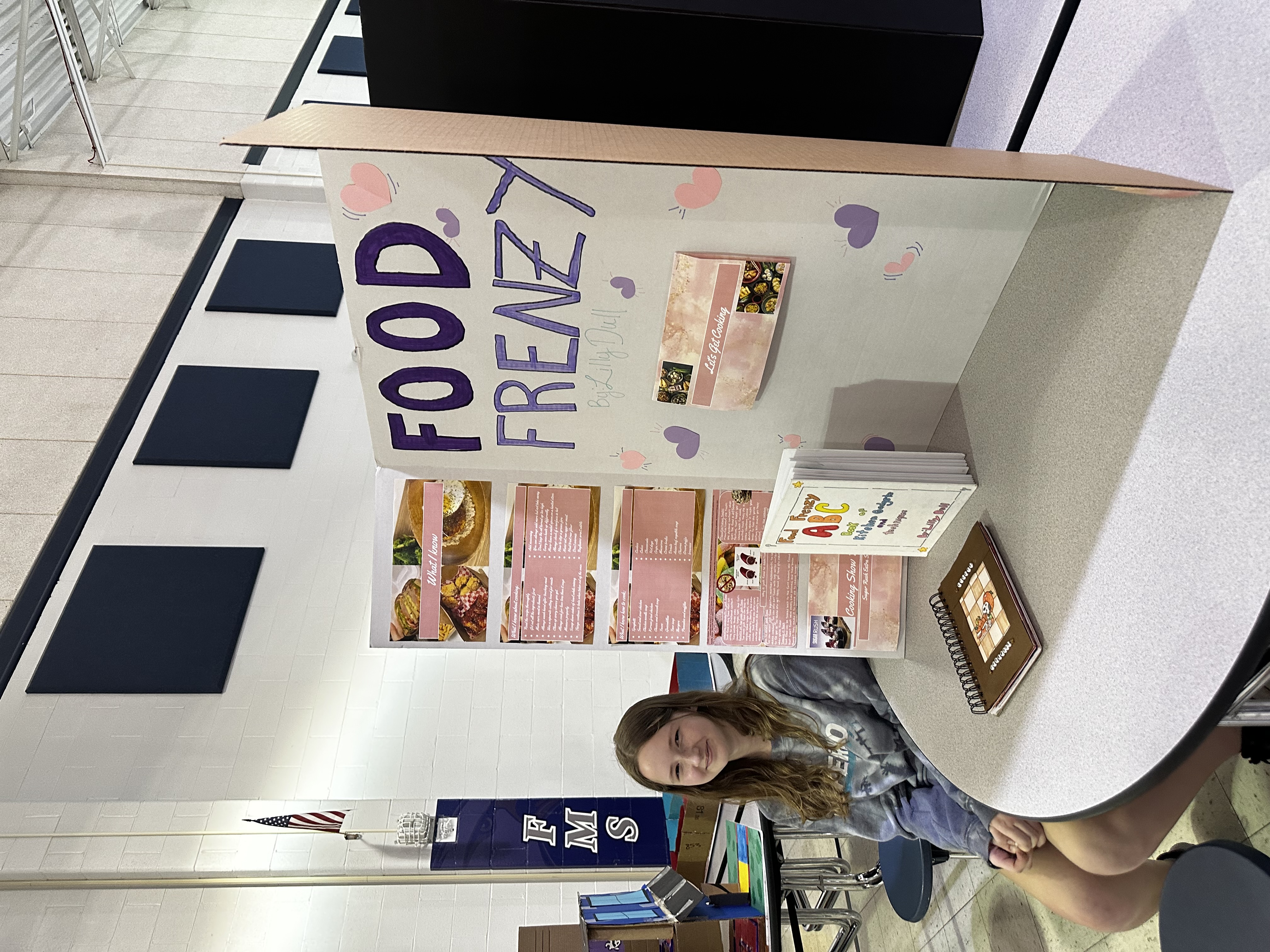 Students showing off their Food Frenzy Project at Frontier Middle's Independent Project Night