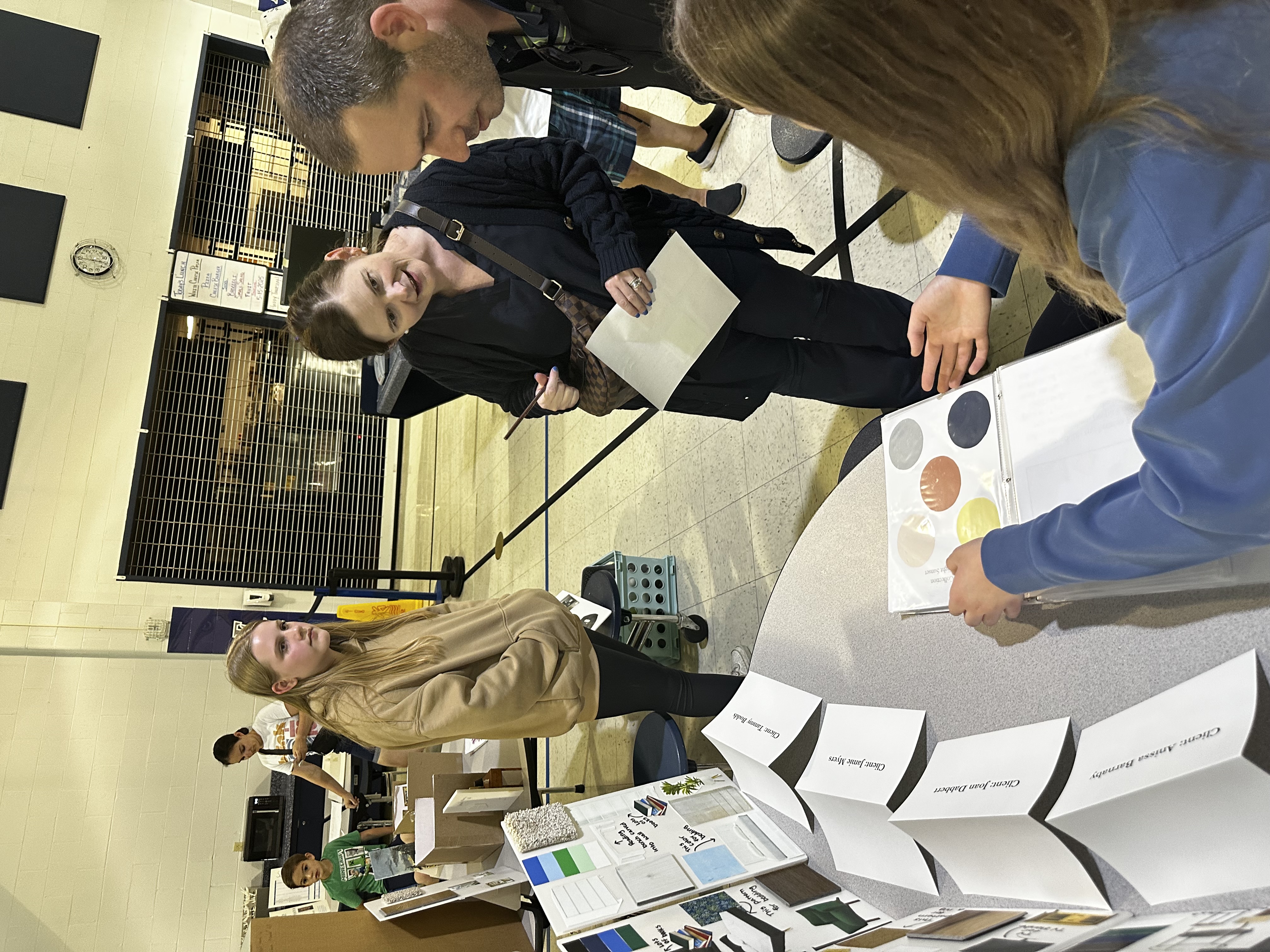 Students showing off their projects and getting parent feedback at Frontier Middle's Independent Project Night