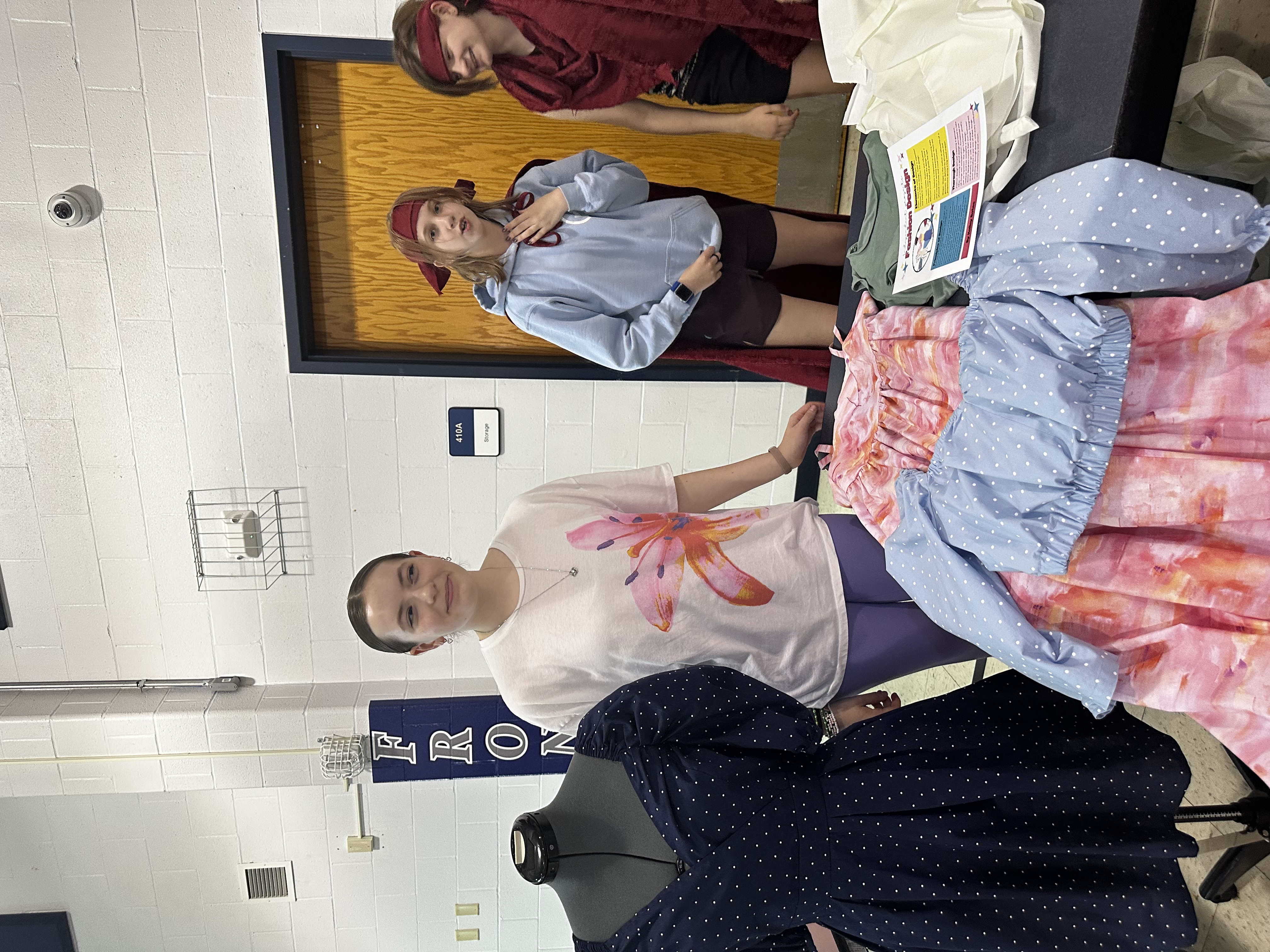 Students showing off their Fashion Design Project at Frontier Middle's Independent Project Night
