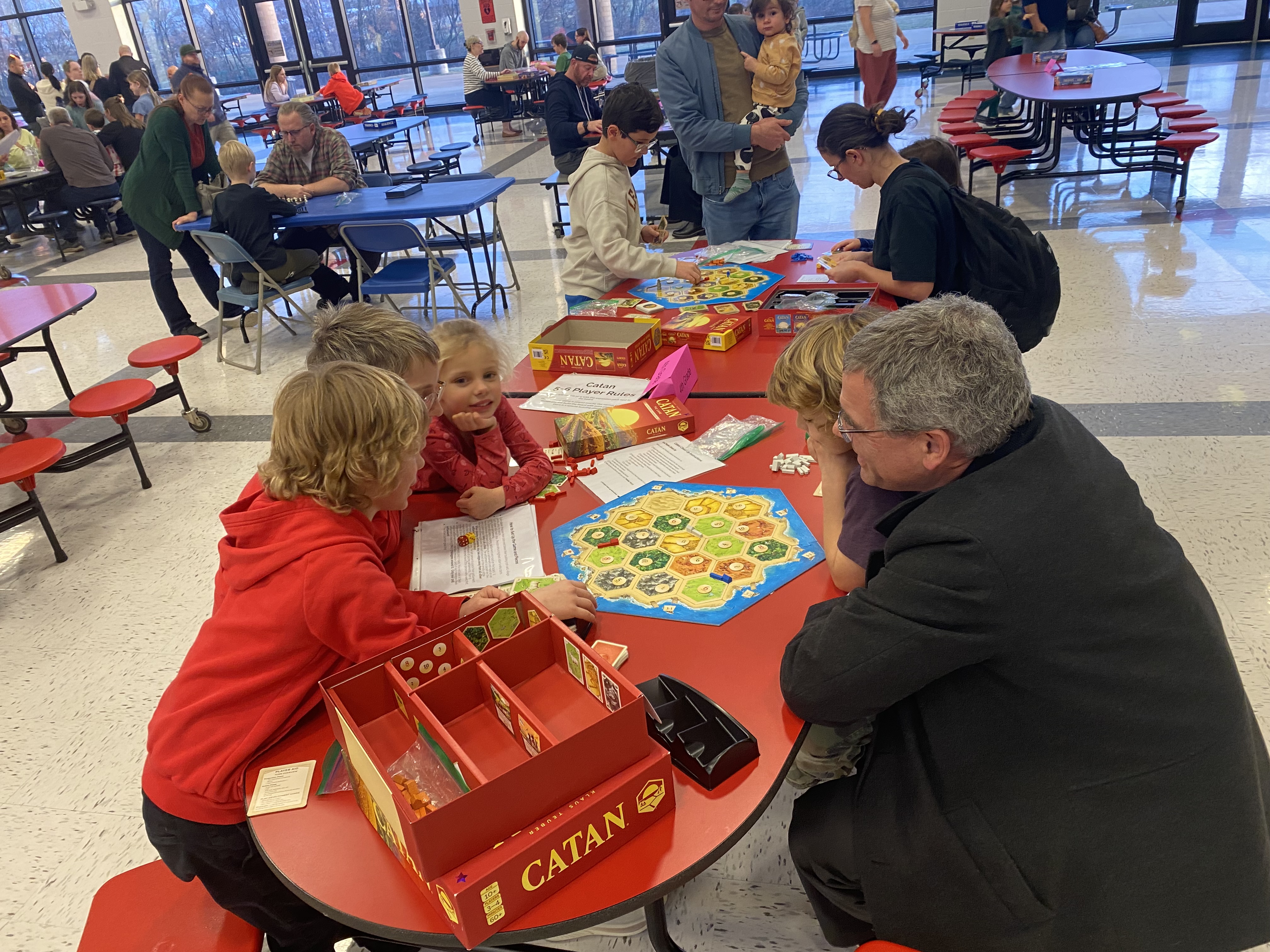 Family playing Catan at the Horizons Family Night