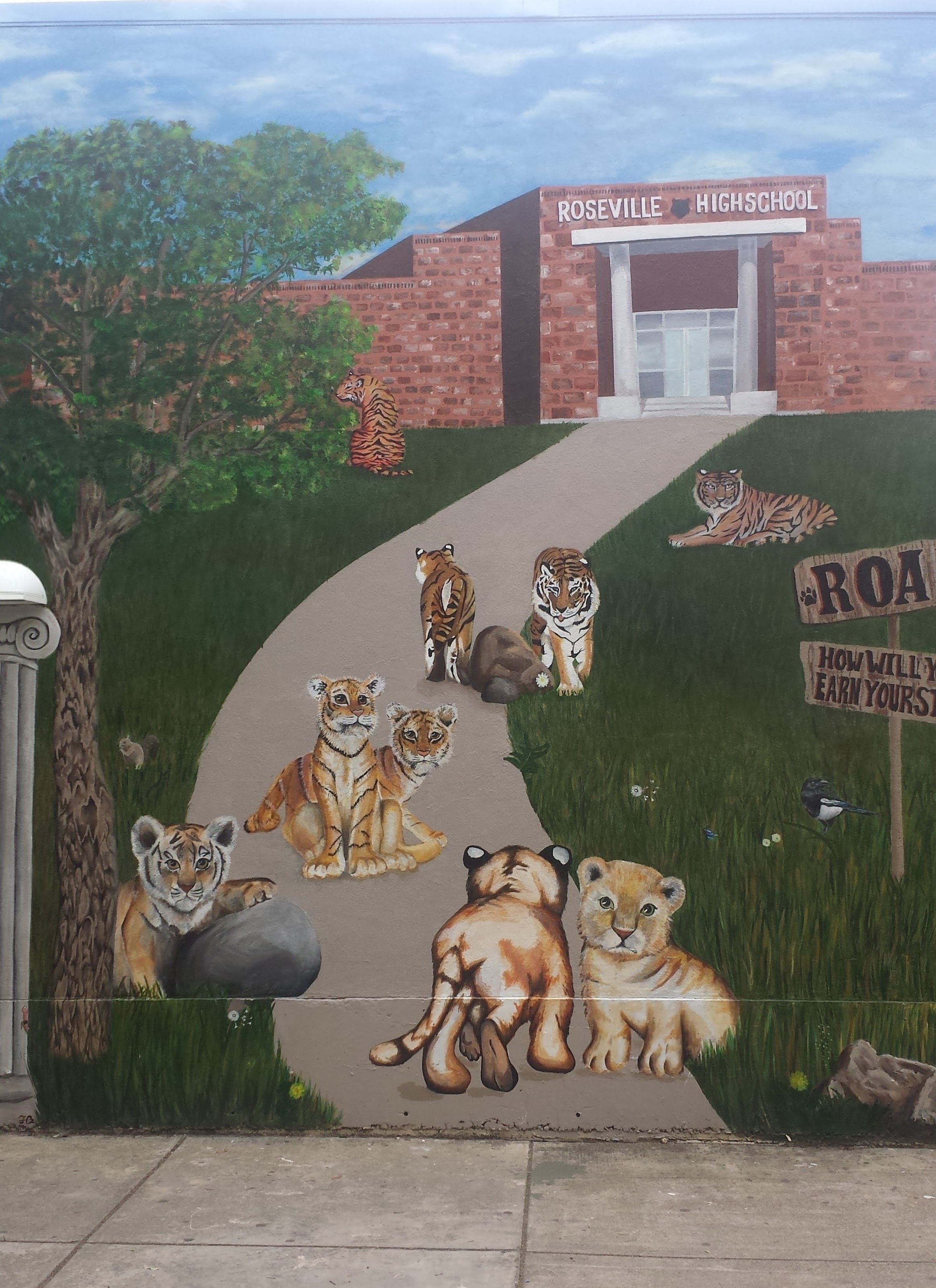 Mural on side of Library Building depicting a tiger family