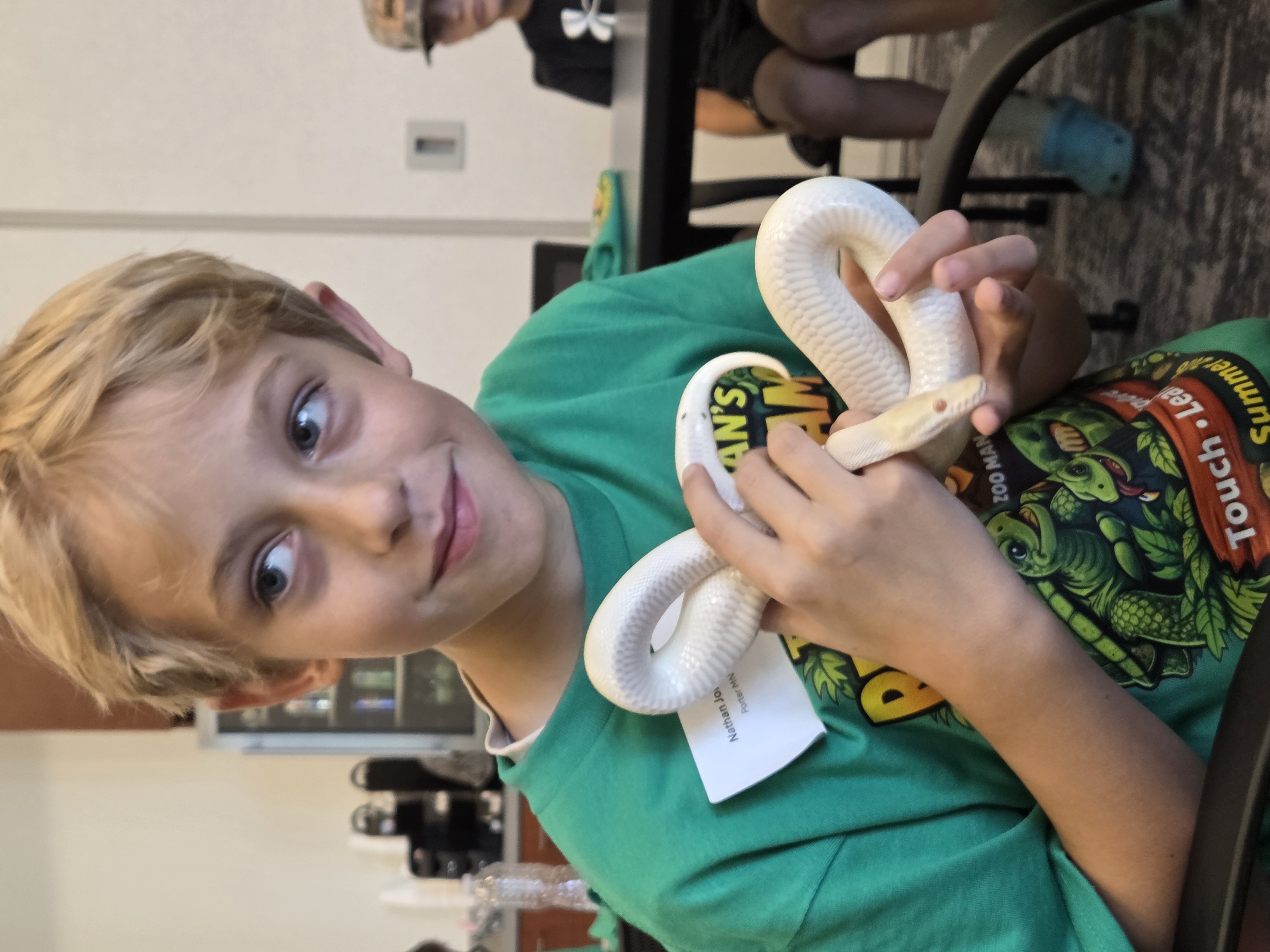 Student Holding Snake