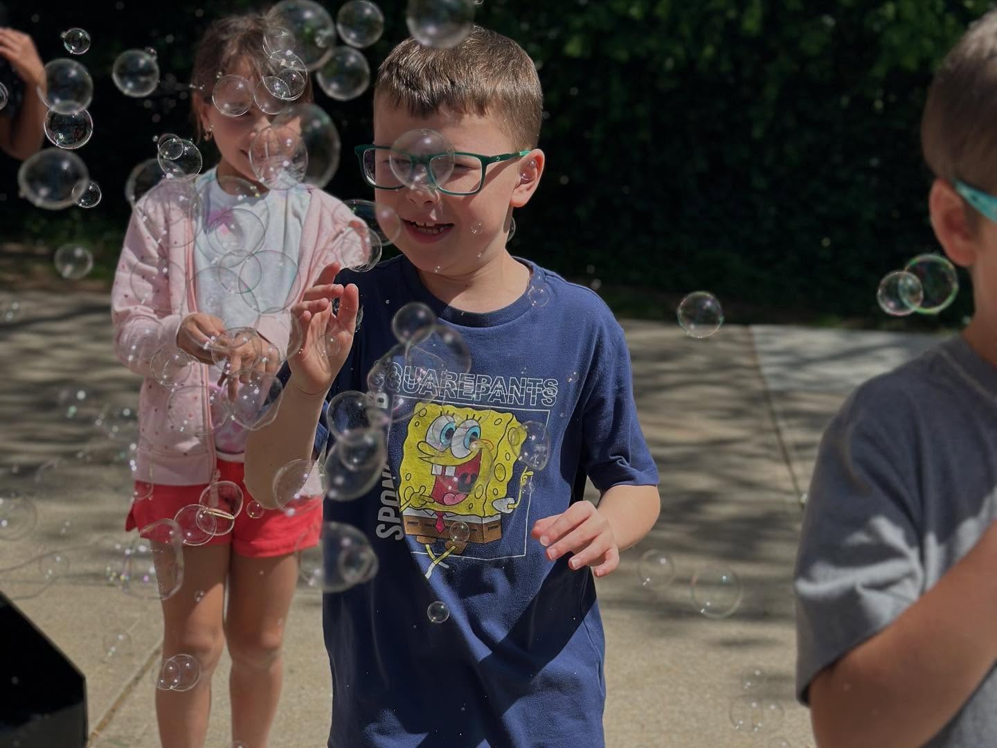 Preschool and Kindergarten students enjoying and outdoor activity