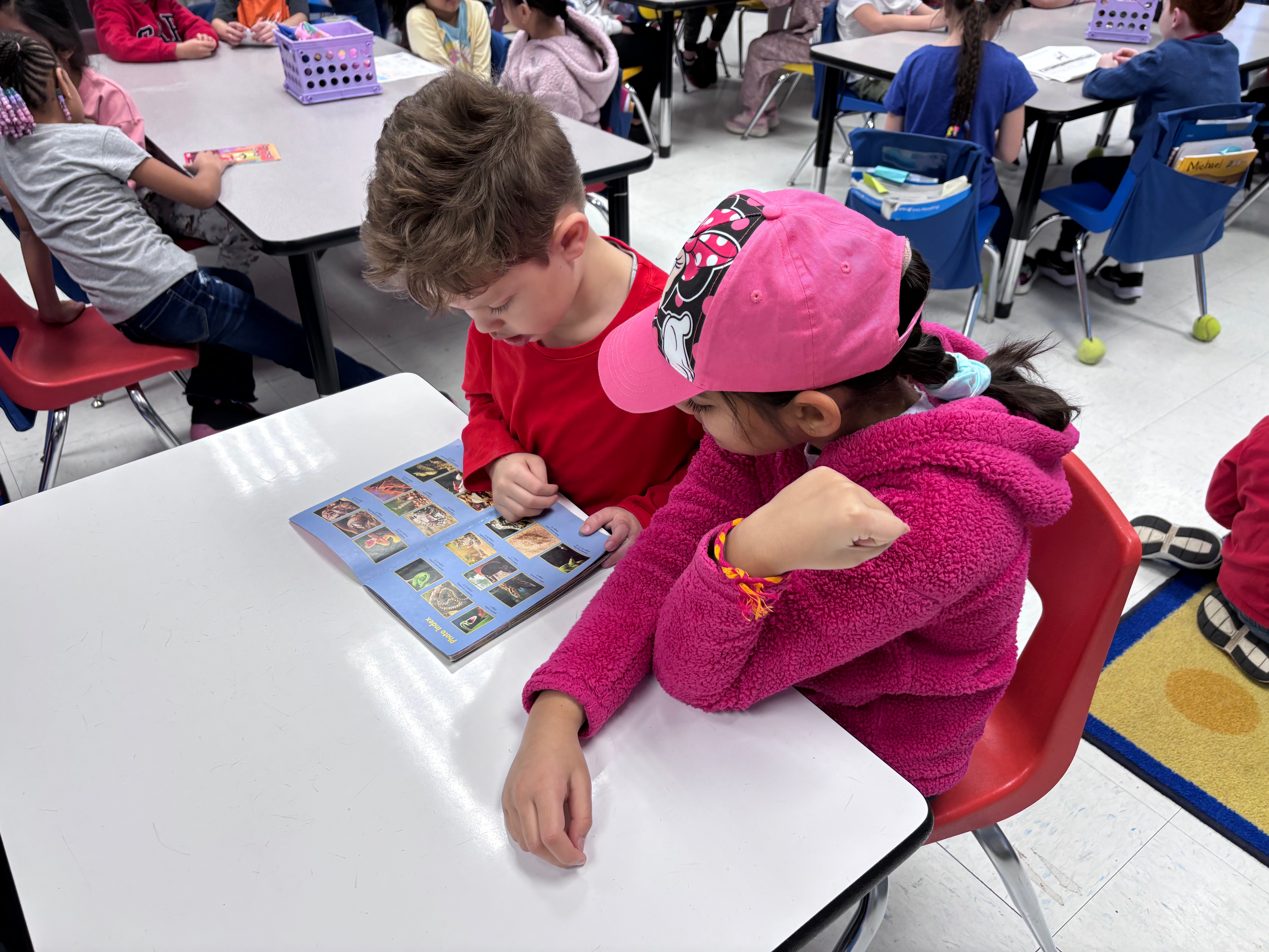 Students reading together.