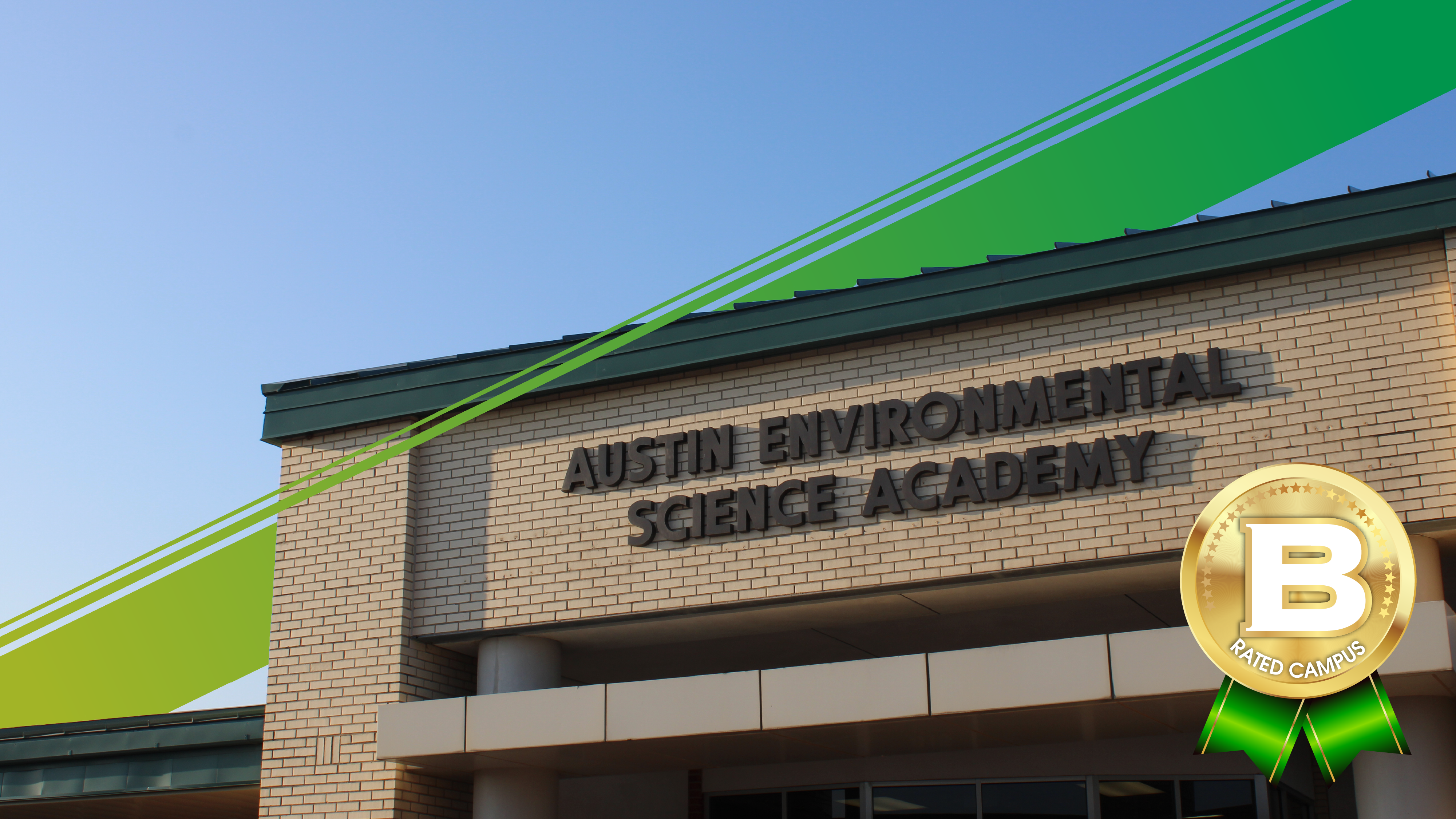 A brick building with "Austin Environmental Science Academy" written on it is in the foreground, with a clear blue sky in the background.