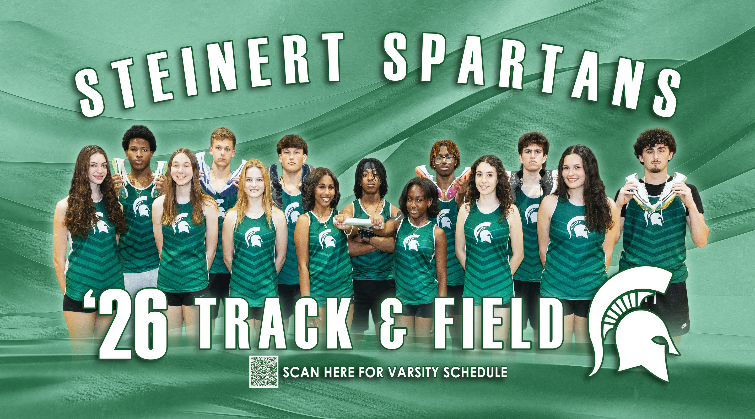 A group of young athletes in green and white track uniforms stand in the foreground with "STEINERT SPARTANS '26 TRACK &amp; FIELD" text above them, against a blurred green background.