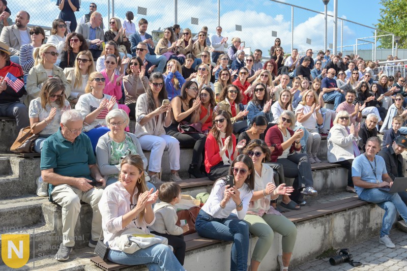 Parents and students filling the outdoor stands at the Parade of Nations
