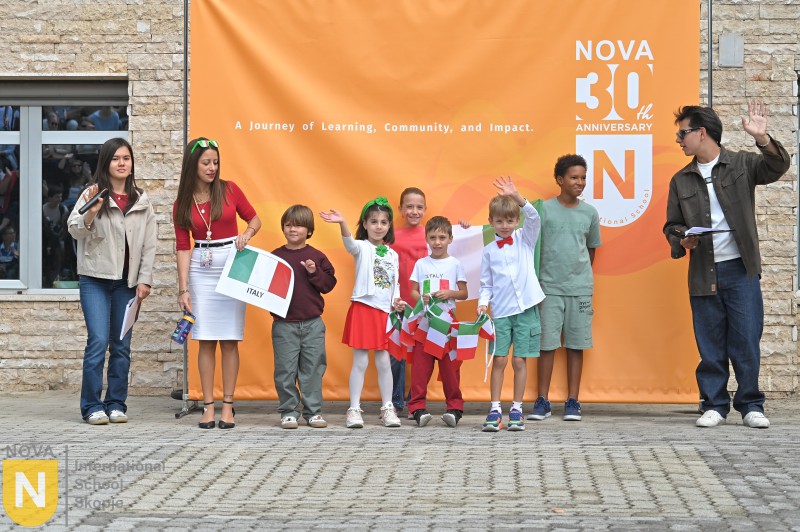 Group of children with flags at the Parade of Nations