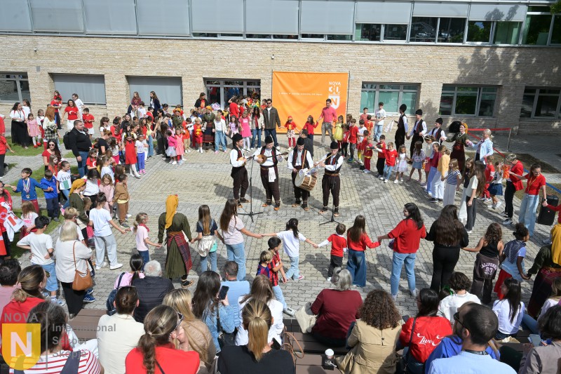 Crowd of students and families in the schoolyard during the Parade of Nations