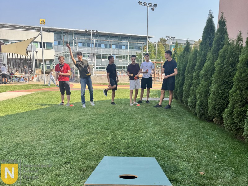Students playing a game on the school lawn during House competitions